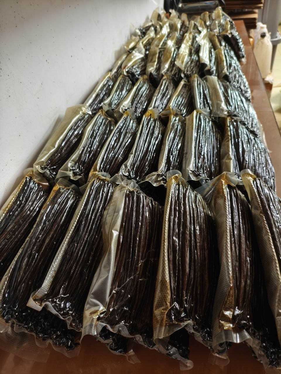 Vanillature vanilla beans packed and export-ready in sealed cartons